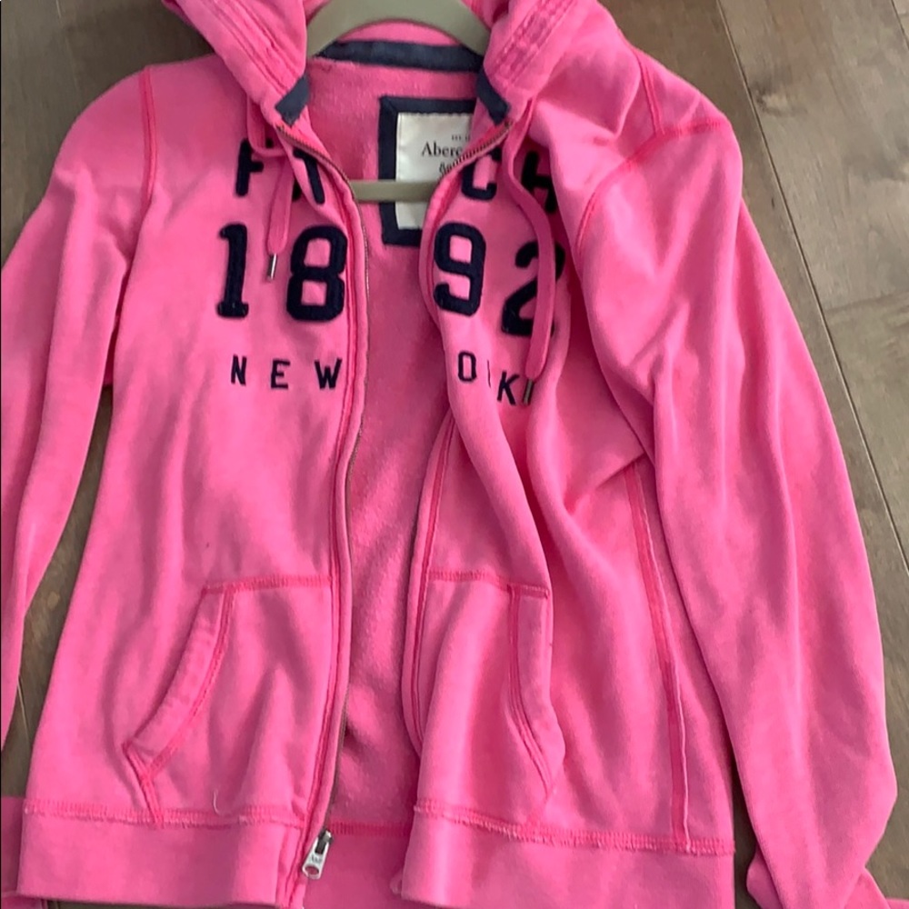 Pink zip up sweat shirt